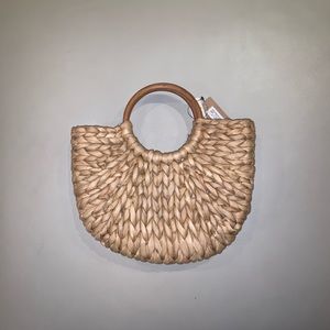 Twist Knotted Handled Clutch Bag. Crossbody.